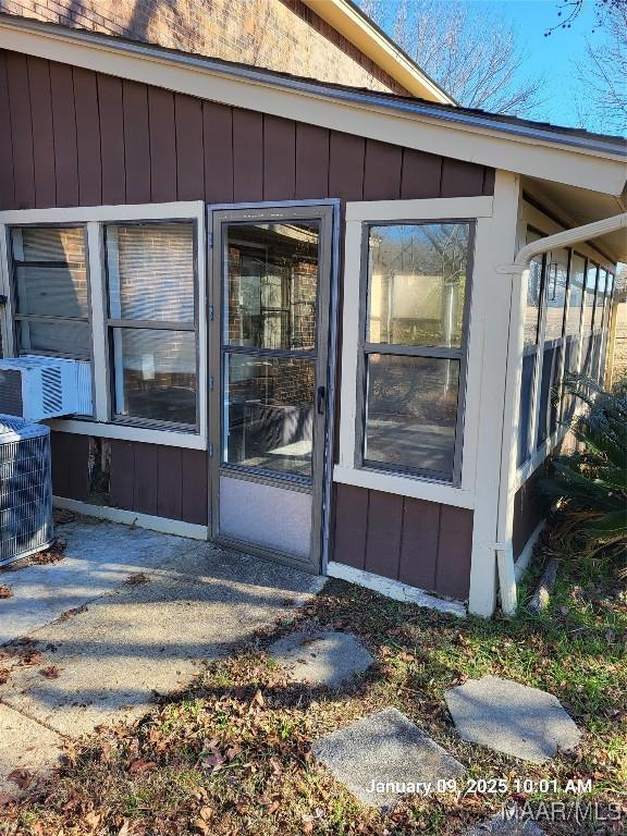 property entrance with cooling unit