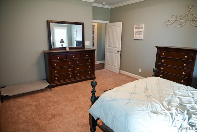 carpeted bedroom featuring crown molding