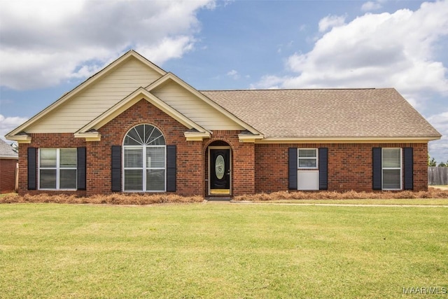 view of front of home with a front lawn