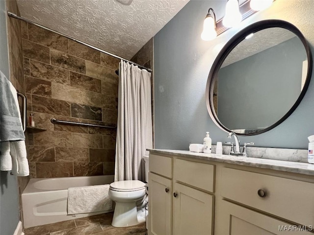 full bathroom featuring vanity, shower / bath combination with curtain, a textured ceiling, and toilet