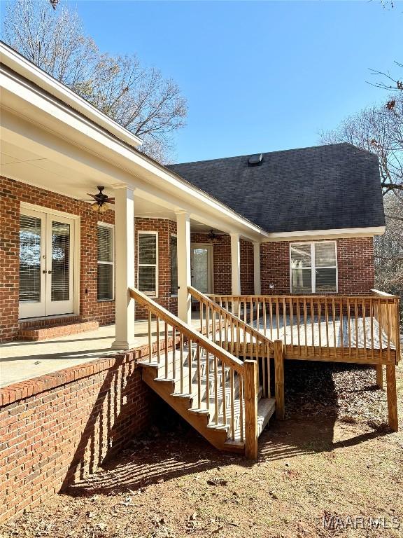 exterior space featuring ceiling fan and french doors