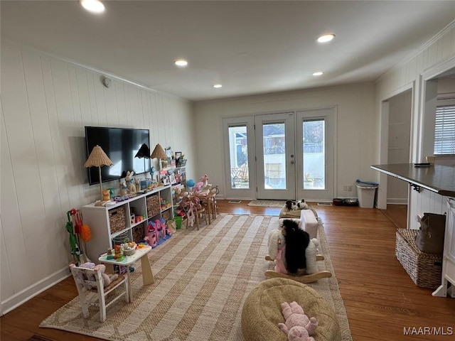 rec room featuring hardwood / wood-style floors and french doors