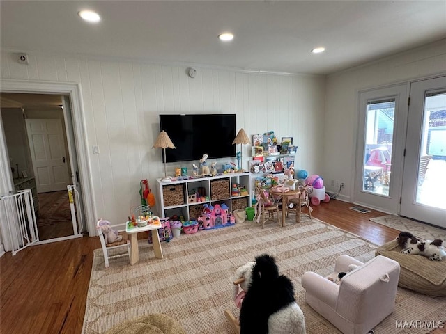 game room with hardwood / wood-style flooring