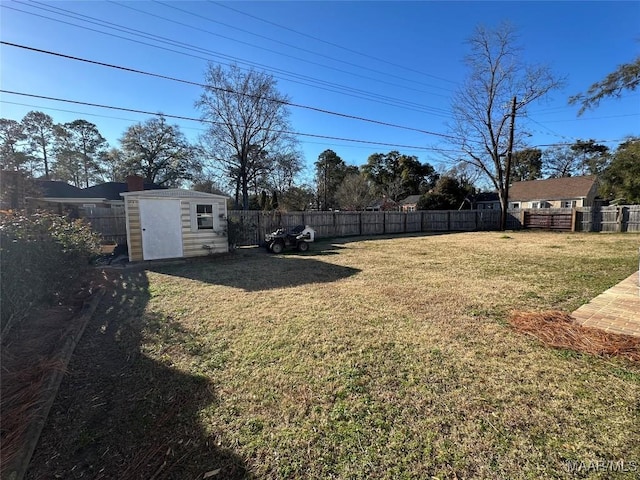 view of yard with a storage unit