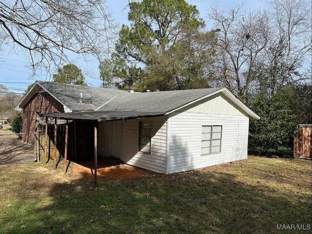 view of property exterior with a yard