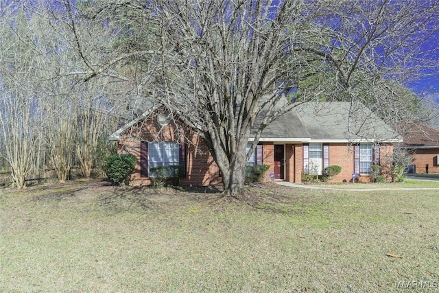 ranch-style house with a front lawn