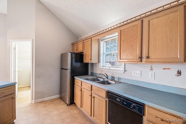 kitchen with dishwasher, sink, stainless steel fridge, a textured ceiling, and lofted ceiling