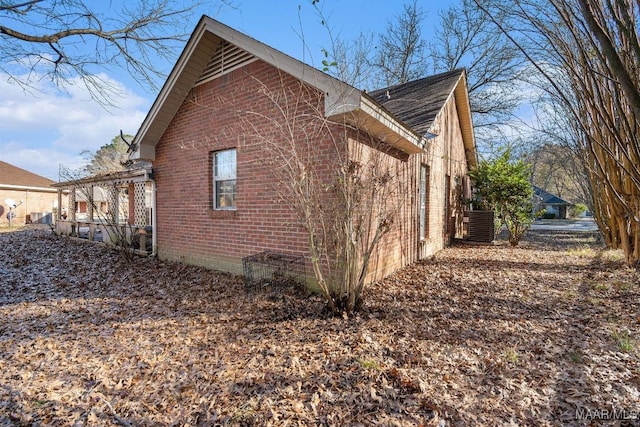 view of home's exterior with central AC unit