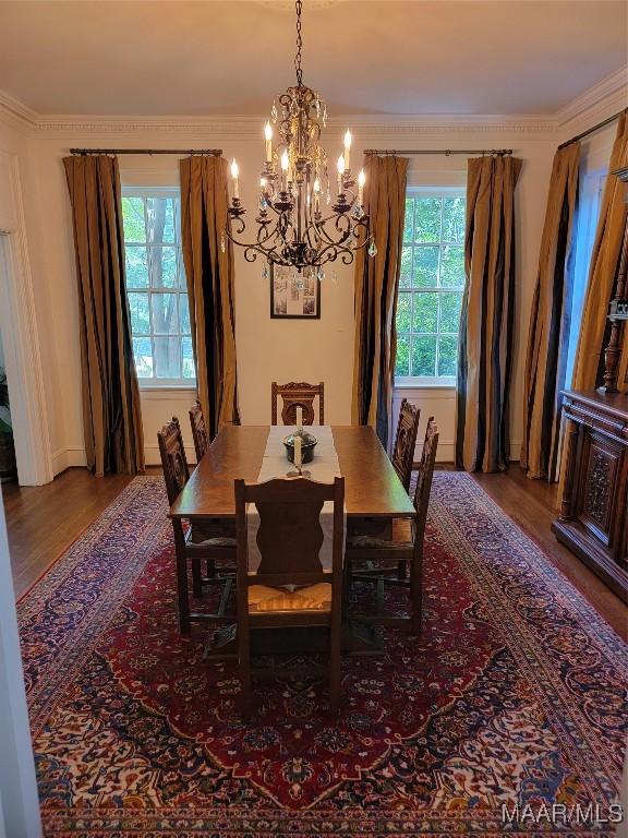 835 Park Ave, Montgomery, AL 36106 - dining room featuring hardwood / wood-style floors, a wealth of natural light, and a notable chandelier