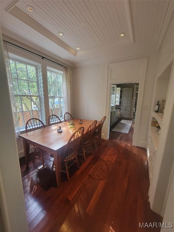 835 Park Ave, Montgomery, AL 36106 - dining space with a tray ceiling, dark hardwood / wood-style flooring, wood ceiling, and ornamental molding