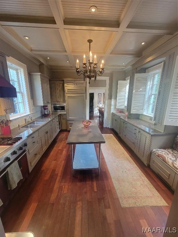 835 Park Ave, Montgomery, AL 36106 - kitchen featuring built in appliances, decorative light fixtures, coffered ceiling, and sink