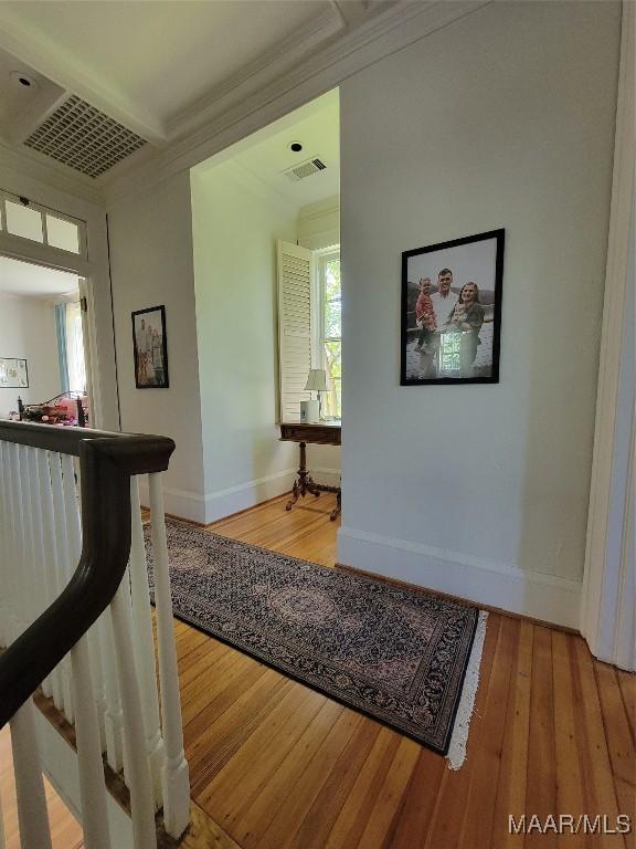 835 Park Ave, Montgomery, AL 36106 - hallway with ornamental molding and light wood-type flooring