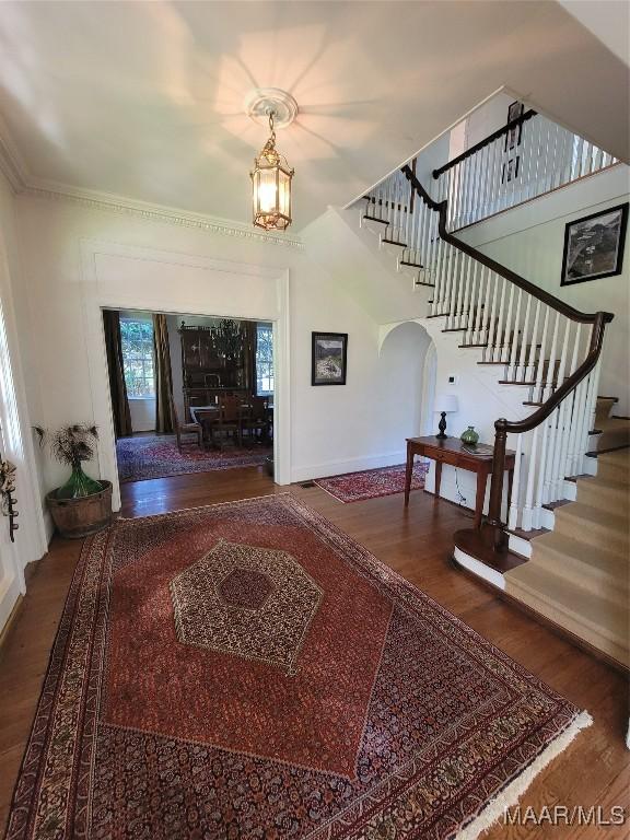 835 Park Ave, Montgomery, AL 36106 - foyer with hardwood / wood-style floors, an inviting chandelier, and ornamental molding