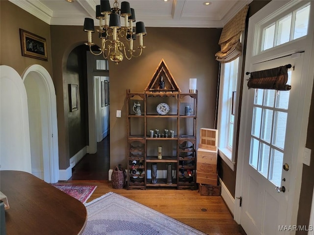 835 Park Ave, Montgomery, AL 36106 - dining room featuring beamed ceiling, a notable chandelier, wood-type flooring, and crown molding