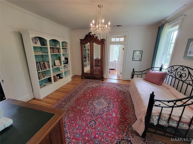 835 Park Ave, Montgomery, AL 36106 - sitting room featuring ornamental molding, a notable chandelier, and hardwood / wood-style flooring