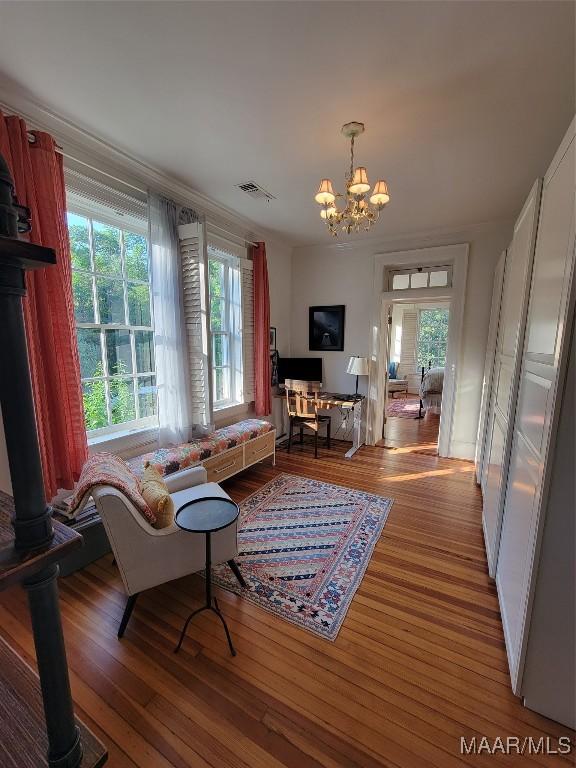 835 Park Ave, Montgomery, AL 36106 - living room with hardwood / wood-style floors and a notable chandelier