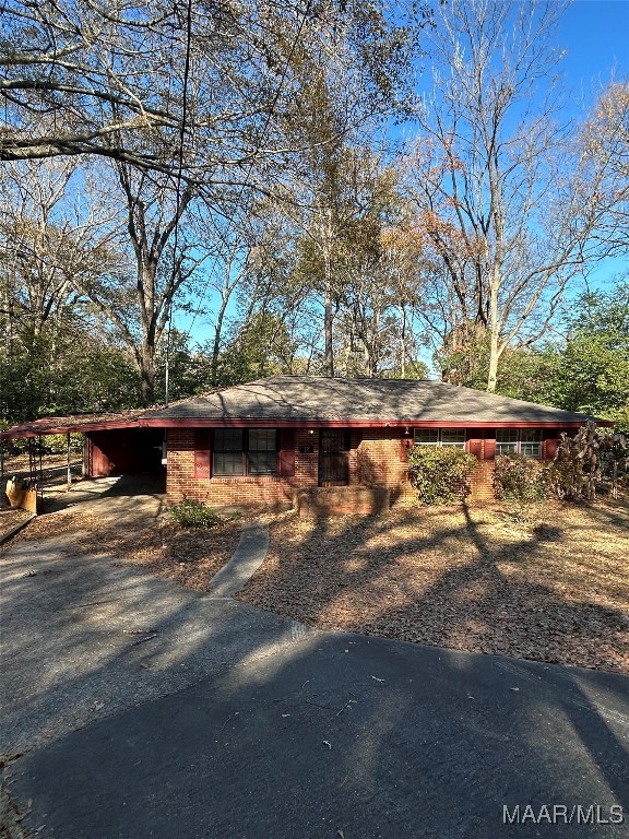 view of front of house with a carport