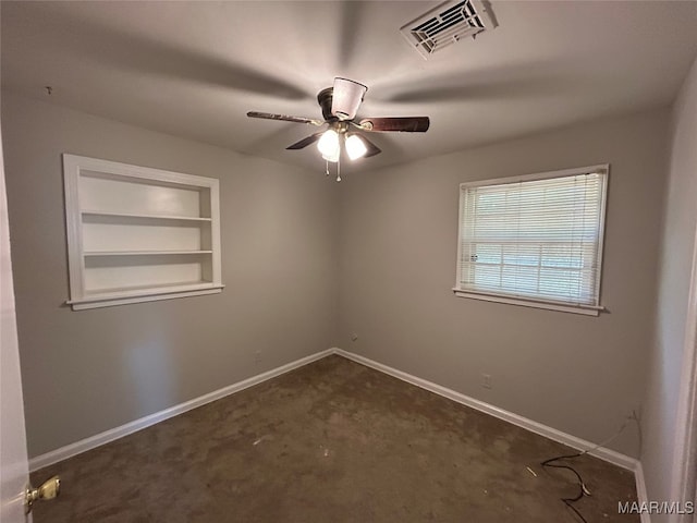 unfurnished room with ceiling fan, built in features, and dark carpet