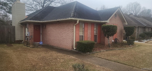 view of home's exterior featuring a lawn