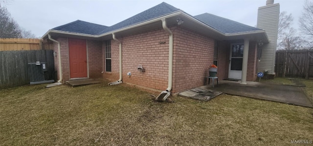 view of property exterior featuring a yard