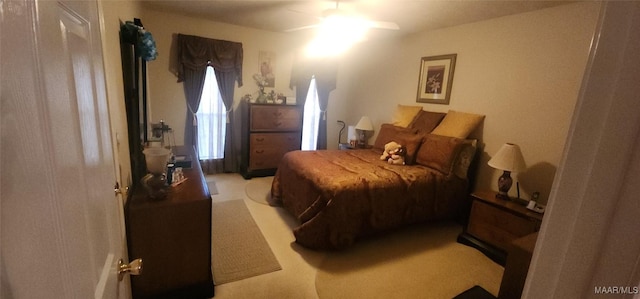 bedroom with carpet flooring and ceiling fan