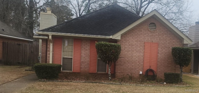 exterior space featuring a front yard