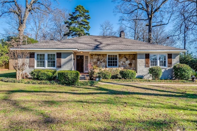 ranch-style house with a front yard