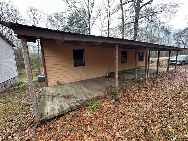 back of property with a patio