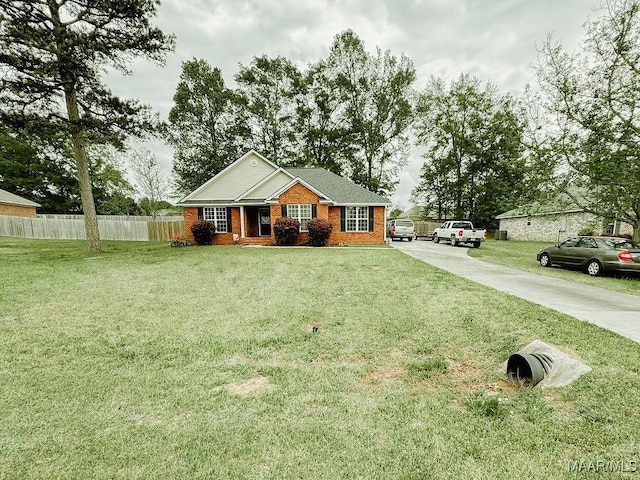 ranch-style home with a front yard