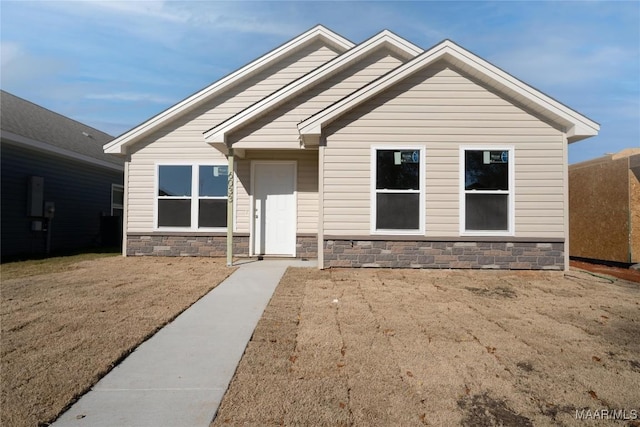 view of front facade featuring stone siding