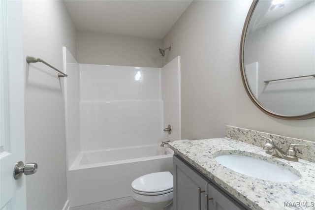 full bathroom featuring toilet, bathing tub / shower combination, and vanity