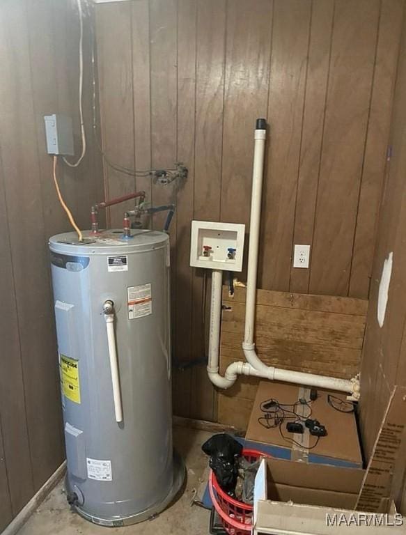 utility room featuring water heater