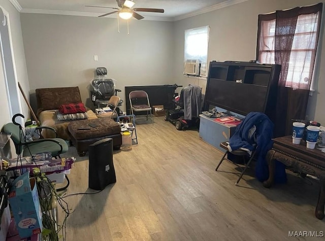 office featuring cooling unit, crown molding, ceiling fan, and hardwood / wood-style flooring