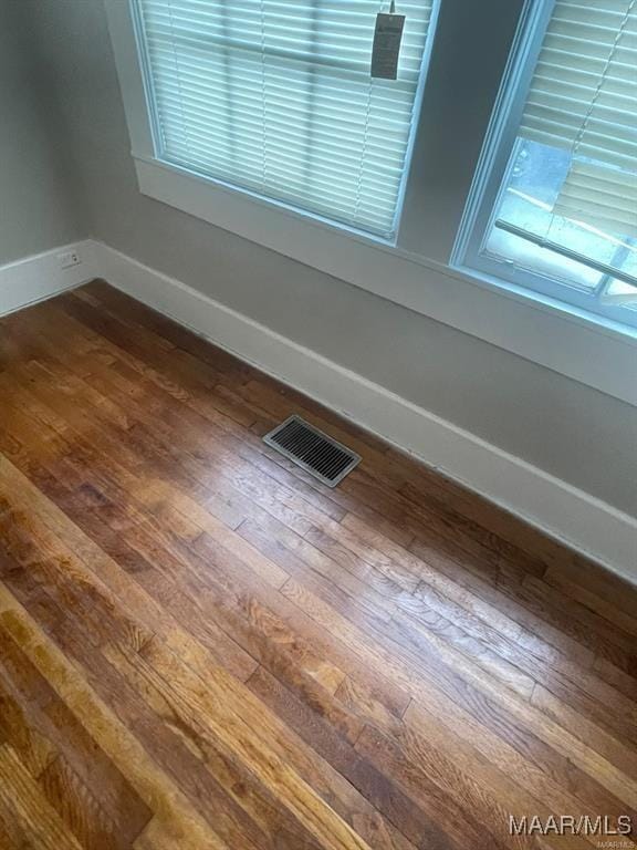 details with hardwood / wood-style flooring