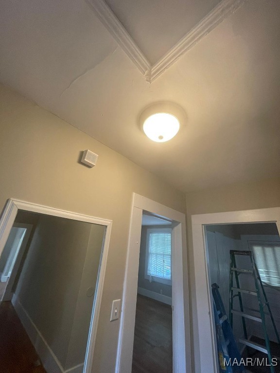 interior space featuring crown molding