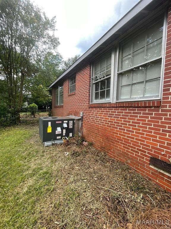 view of home's exterior featuring a yard