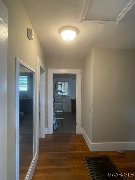 corridor with dark wood-type flooring