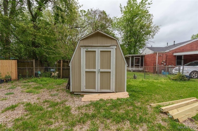 view of outdoor structure with a yard