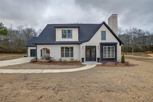 34 Creekwood Dr Unit 2, Clanton, AL 35045 - view of front of property with french doors and a garage