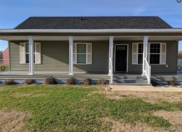 bungalow with a front yard