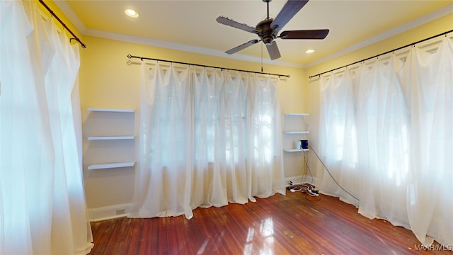 unfurnished room with crown molding, ceiling fan, and hardwood / wood-style flooring