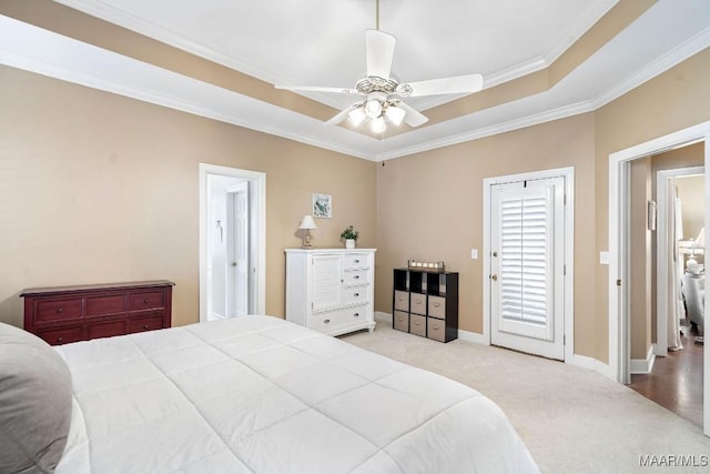 bedroom with light carpet, a raised ceiling, ceiling fan, and crown molding