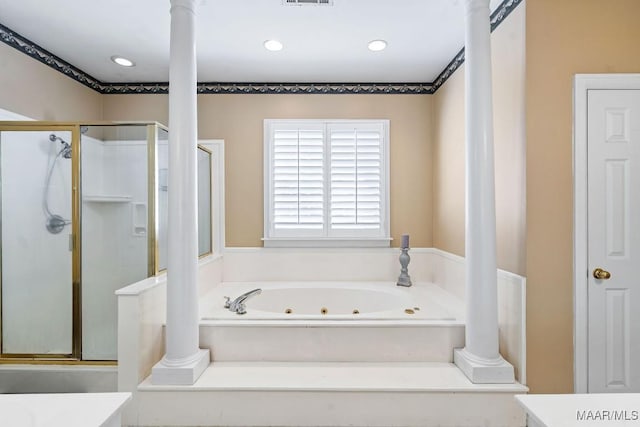 bathroom with shower with separate bathtub