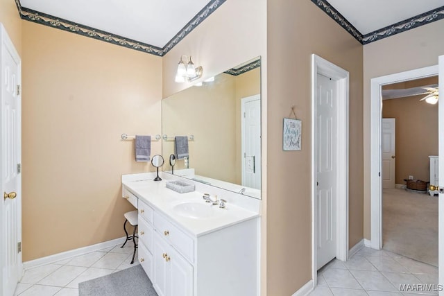 bathroom with vanity, tile patterned floors, and ceiling fan