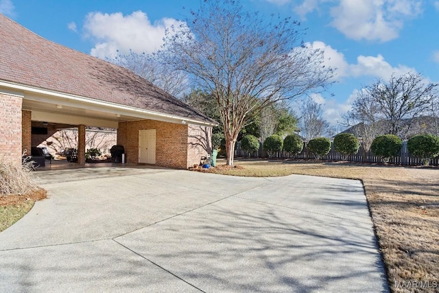 view of patio / terrace featuring a carport