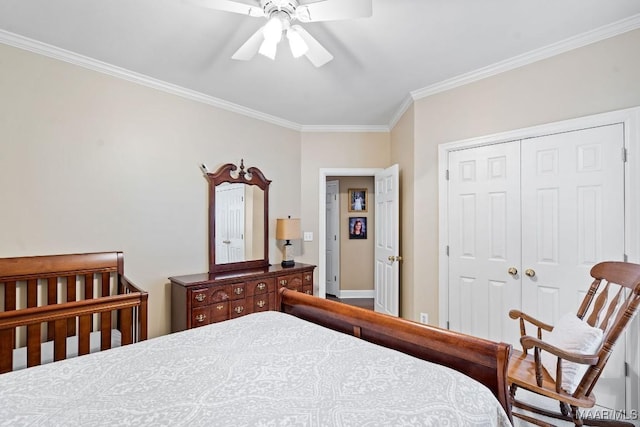 bedroom with a closet, ceiling fan, and crown molding