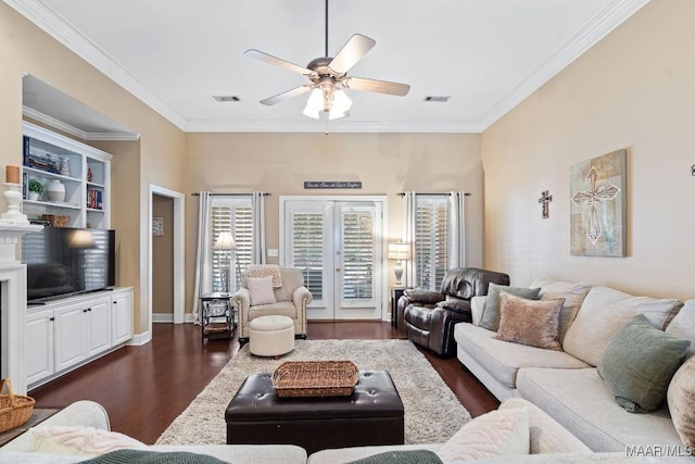 living room featuring crown molding, ceiling fan, and dark hardwood / wood-style floors