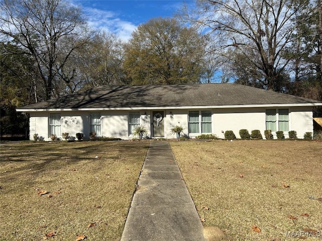 ranch-style house with a front yard