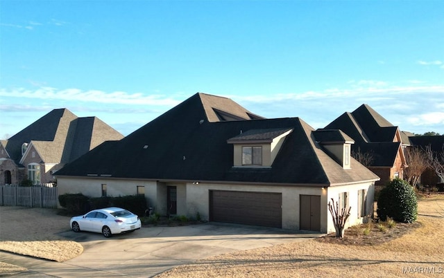 8513 Rockbridge Cir, Montgomery, AL 36116 - view of front of property featuring driveway and stucco siding