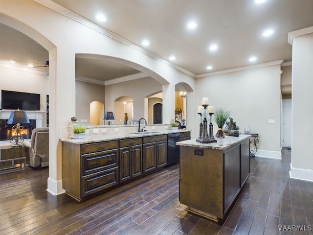 8513 Rockbridge Cir, Montgomery, AL 36116 - kitchen featuring a sink, dark wood-style floors, dishwasher, light stone counters, and crown molding